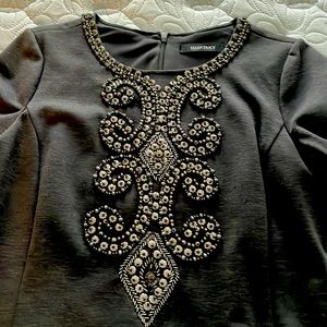 Beaded grey long sleeved dress, knee length